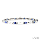 5x3 MM Oval Cut Tanzanite and 1/10 ctw Bar and Oval Mount Round Cut Diamond  Precious Bracelet in 10K White Gold